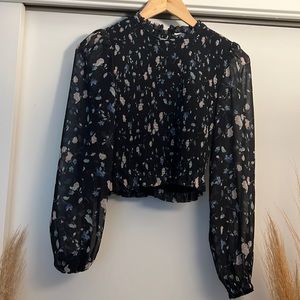 black cropped blouse with floral print